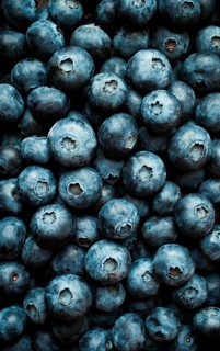 Fresh blueberry background, top view, food wallpaper