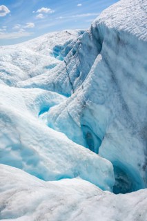 Waterfall in a crevasse on the ice of Root Glacier, Wrangell St. Elias National Park, Alaska, USA