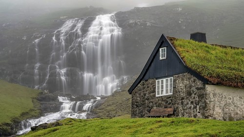 The waterfall with a view of Saksun, Faroe Islands, Denmark, Faroe Islands, Denmark