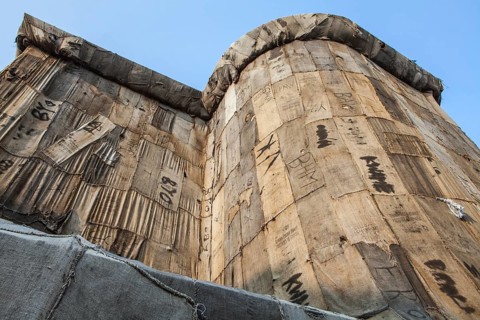 Torwache wrapped with old jute sacks, Check Point Sekondi Loco, by artist Ibrahim Mahama, documenta
