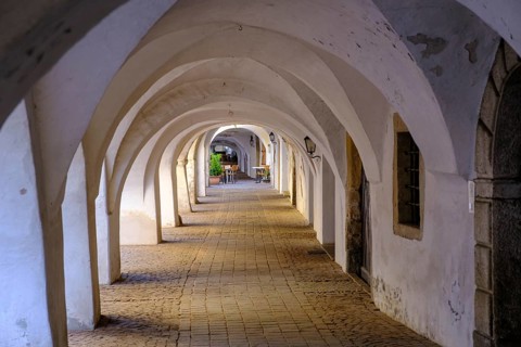 Arcades, archways in the old town centre, Neumarkt, Unteretsch, South Tyrol, Italy