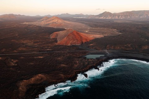 Captivating drone shot of Timanfaya National Park showing the rugged volcanic landscape and