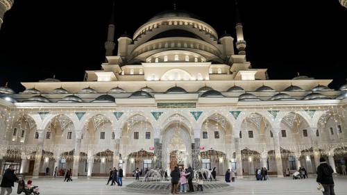Muslims perform Tarawih prayers at the Millet Mosque, the second largest mosque in Turkey, which is