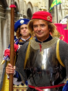 Il Palio di Siena, historical horse race, knight with lance of the Nobile Contrada del Nicchio,