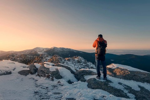 A photographer captures the breathtaking snowy landscape of Siete Picos in Guadarrama Mountains,