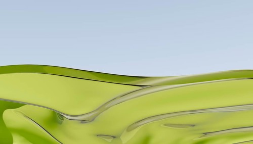 A 3D rendering of smooth green liquid waves flowing against a pale blue sky. The abstract design
