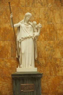 Eirene sculpture with the Pluto's cub, Greek goddess for peace with Plutos in her arms, boy,