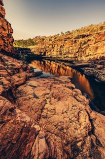 Bell Gorge waterfall, a body of water in north-west Australia in the Kimberley. Sunrise in the