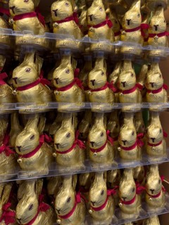 Display on shelf of retail wholesale of chocolate Easter bunnies chocolate Easter bunnies Easter
