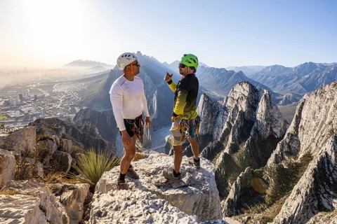 Adventurer receiving mountaineering and rappelling lessons at the breathtaking Eagleâ€™s Nest in