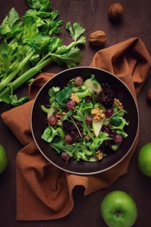 Fresh, Waldorf salad, celery stalk with chicken, apple and walnut, grapes, herbs, homemade, no