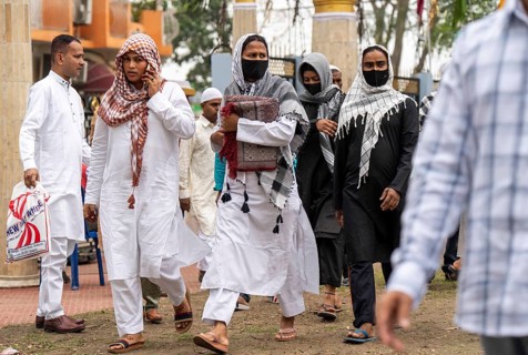 Muslims arrives to Eid al-Fitr prayer at Eidgah, on March 21, 2026 in Guwahati, India. Muslims make