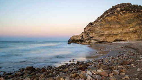 Sunrise on the coast near Mirbat, Oman