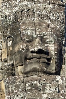Giant stone-carved face of the Bodhisattva Lokeshvara, also known as Avalokiteshvara, Bayon Temple,