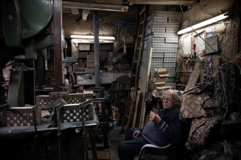 Damascus, Syria. December 10th 2025. Syrian artisan and master craftsman Abu Toni sitting inside