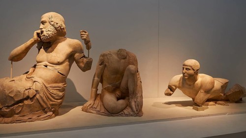Sculpture The Old Seer, kneeling youth, river god Kladeos, east pediment of the Temple of Zeus,