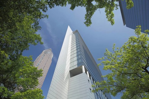 Red exhibition tower, gray castle and blue pollux, modern building, view upwards, perspective,