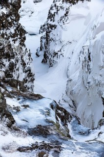 Icy and snow-covered Kolugljufur Canyon, Northern Iceland Vestra, Iceland