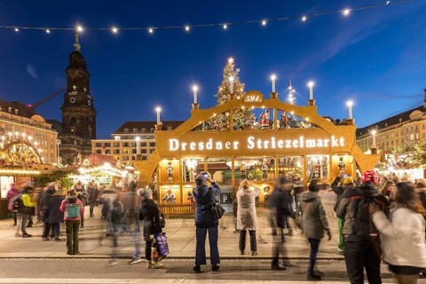 Large walk-in light arch at the entrance to Striezelmarkt, Germany's oldest Christmas market, with