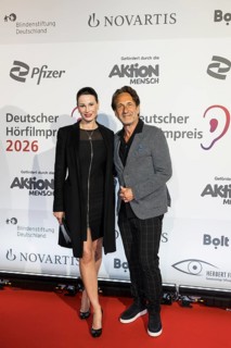Katharina Gerhardt and Falk-Willy Wild in front of the German Audio Film Awards ceremony at the