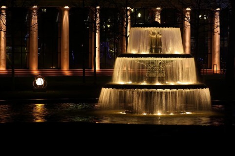 Bowl fountain at night with water features and lighting, night shot, motion blur, long exposure,
