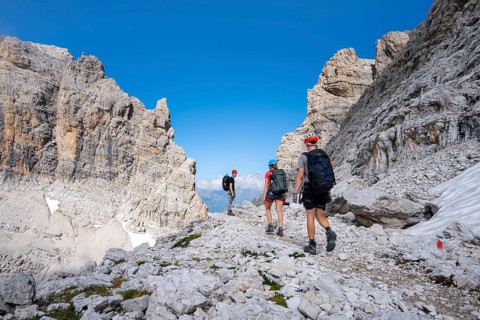 Three mountaineers in the mountains, Via Ferrate Benini Via Ferrate, Brenta Mountains,