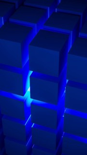 Cube structures create a captivating geometric arrangement highlighted by blue light, showcasing