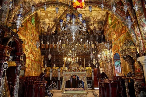 Magnificent church interior with icons, chandeliers and baroque decorations, Holy Week, Bay of