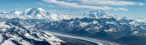 Panorama, clouds over high mountains, Mt Foraker and Mt Denali or Mount McKinley with Kahlitna