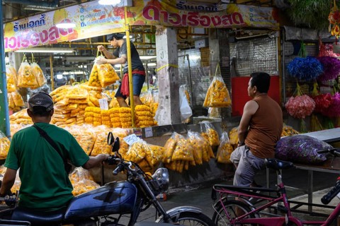 Bangkok, Thailand. March 2rd 2025. Thai workers inside Pak Khlong Talat-Bangkok Flower Market, a