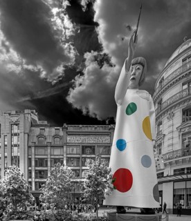 Gigantic figure of Japanese artist Yayoi Kusama pointing at Louis Vuitton department store, black