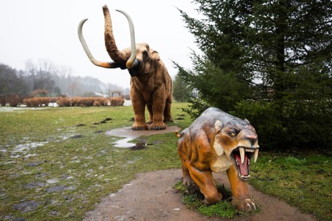LUBIN, POLAND - JANUARY 15, 2026 - Park Wroclawski. Prehistoric mammal models including a woolly