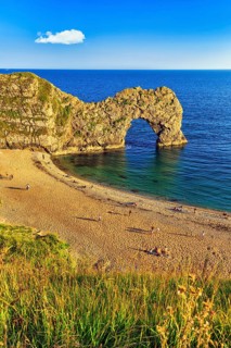 Coastline with bathing beach at Durdle Door, limestone rock bridge, UNESCO World Heritage Site,