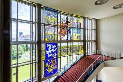 Stained glass window depictions from the history of the German labor movement by Walter Womacka in