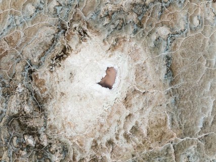 Abstract patterns of saline deposits at the salt works of Walvis Bay. Aerial view. Drone shot.
