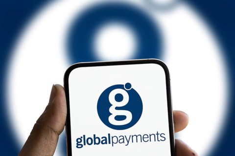 Global Payments logo is displayed on smartphone. Global Payments Inc is an American muntinational