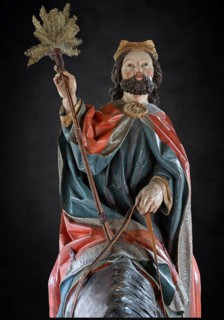 Christ on the palm donkey on a dark background, wooden figure from around 1470, Church of St
