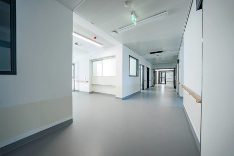 Long, linear hospital corridor, minimalistic and bright, stroke ward, new Calw hospital, Germany