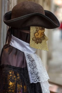 Venetian carnival costume in front of a shop, Venice, Veneto, Italy