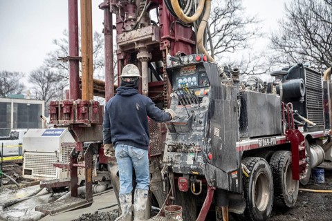 Detroit, Michigan - Workers for Crabtree Drilling drill a series of 500-foot deep wells for a