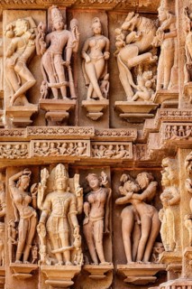 Famous erotic stone carving sculptures, Lakshmana Temple, Khajuraho, India. Unesco World Heritage