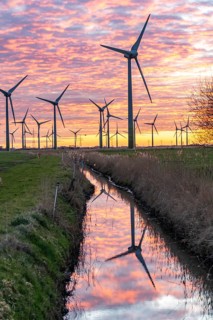 Wind farm near the East Frisian town of Norden, east of the town, sunset, Lower Saxony, Germany