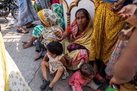 Beggars outside the mosque on the first Friday of the holy month of Ramadan, in Guwahati, India on