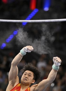 Wei Sun CHN falls from the high bar, Magnesia, gymnastics, artistic gymnastics, men, EnBW
