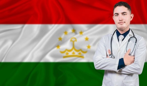Portrait of medical professional on Tajikistan flag background.Tajik national health system