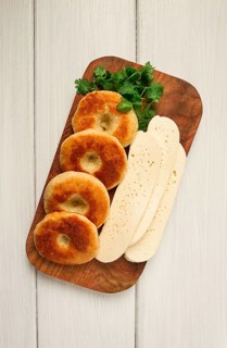 Mchadi, corn tortillas, traditional Georgian dish, corn bread, with Imeretian cheese, homemade, no