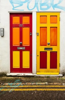 2 colourfully painted front doors in Brighton, Great Britain