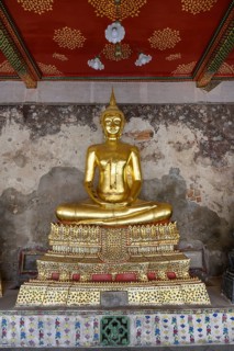 Bangkok, Thailand. February 20th 2025. An ornate golden Buddha in the The Wat Suthat Thepwararam