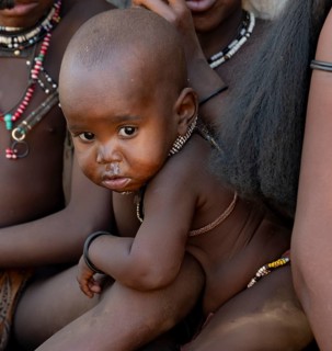 Himba baby, near Opuwo, Kaokoveld, Kunene, Namibia