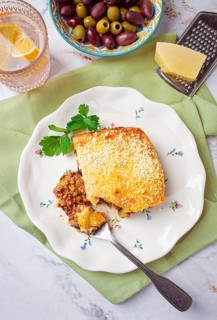 Sliced moussaka, Greek dish, baked eggplant with minced meat, with bechamel sauce, home cooking